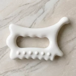 Massaggiatore ergonomico in ceramica per scraping corpo e viso, strumento Gua Sha